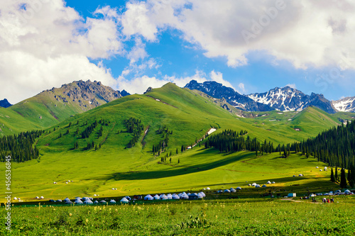 Mongolia yurts in the summer meadows in Nalati scenic spot, Xinjiang Uygur Autonomous Region, China. photo