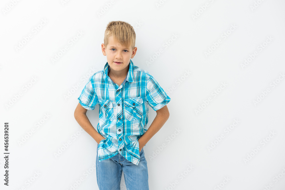Portrait of happy little boy over white background Portrait of happy little boy over white background