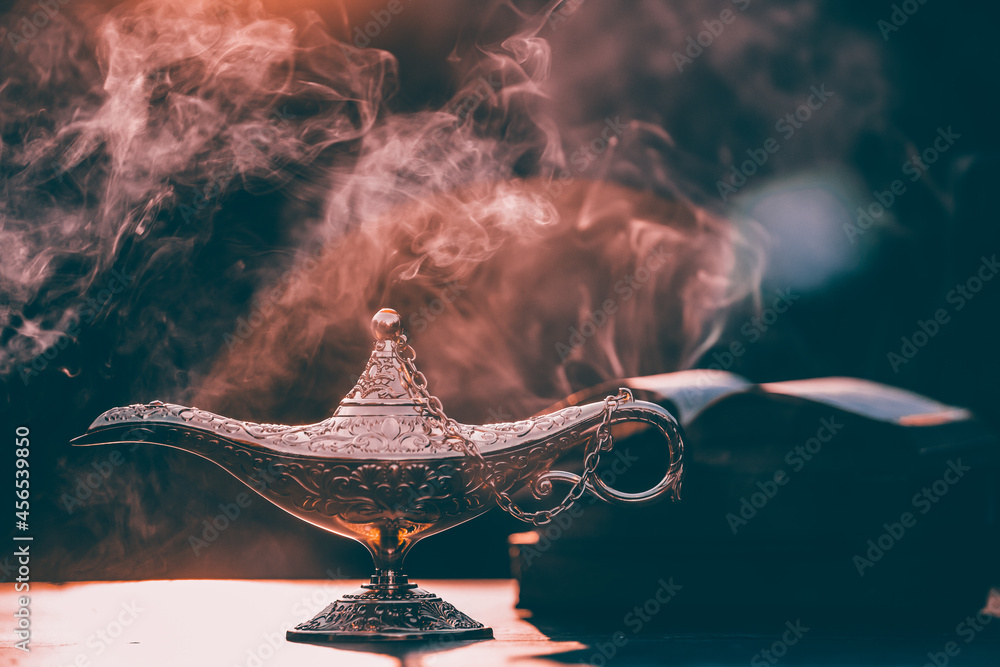 Aladdin lamp of wishes in magic smoke Stock-Foto | Adobe Stock