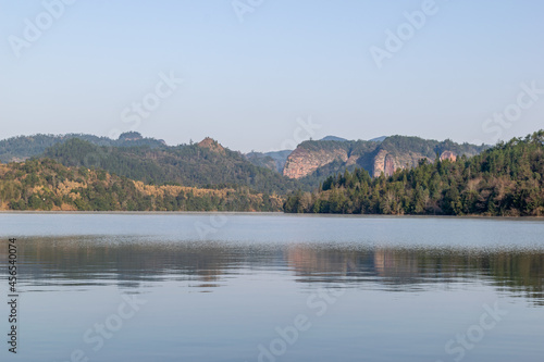 The lake reflects the mountains of Danxia landform