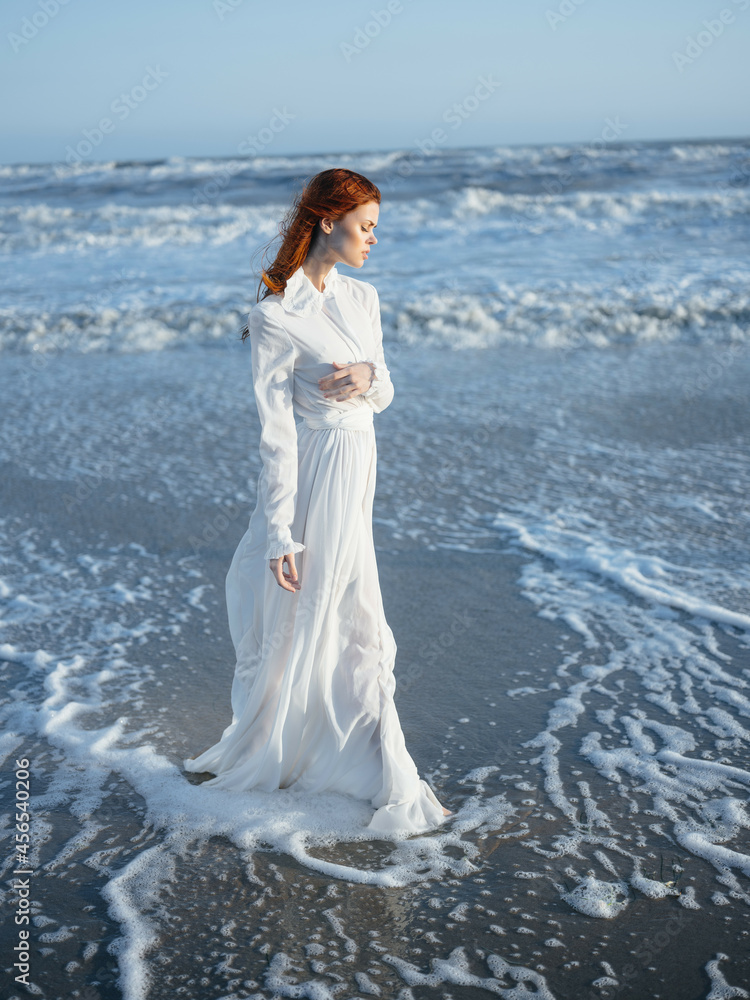 Woman in white dress beach travel vacation landscape Woman in white dress beach travel vacation landscape