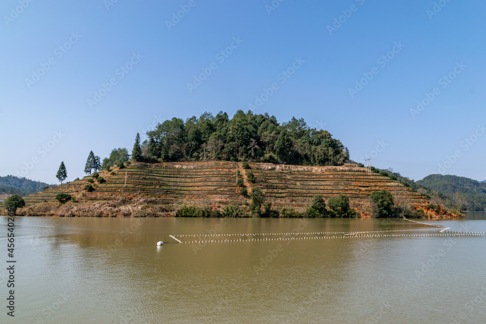 The lake reflects the mountains of Danxia landform The lake reflects the mountains of Danxia landform