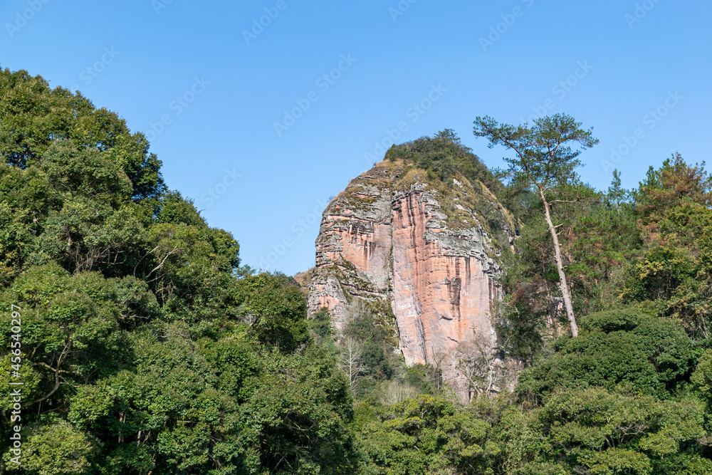Fototapeta premium Danxia landform mountains surrounded by lake water
