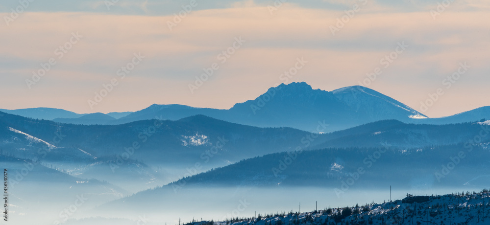 Velky Rozsutec and Stoh in Mala Fatra mountains in Slovakia from Magura Wislanska hill in winter Beskid Slaski mountains in Poland