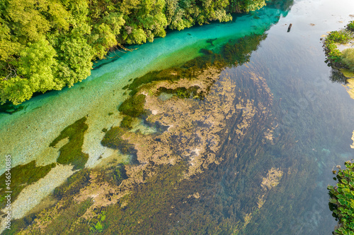 Aerial drone view over The Blue Eye water spring, Albania.