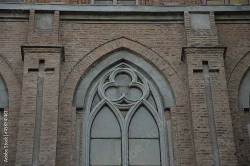 Neogothic window gracing the basilica s wall