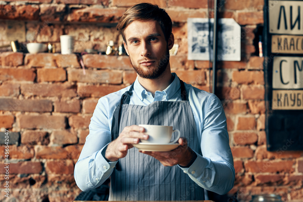 barista in an apron in a cafe work service barista in an apron in a cafe work service