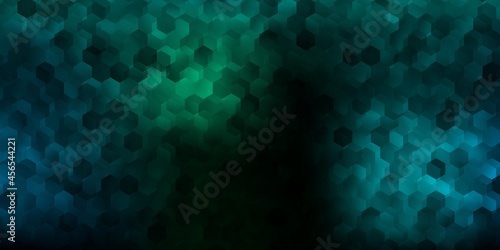 Dark blue  green vector backdrop with a batch of hexagons.