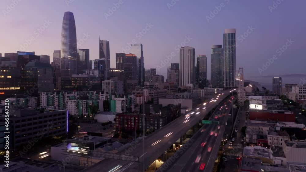 Aerial: Hyperlapse of San Francisco city skyline and freeway at sunset. California, USA Aerial: Hyperlapse of San Francisco city skyline and freeway at sunset. California, USA