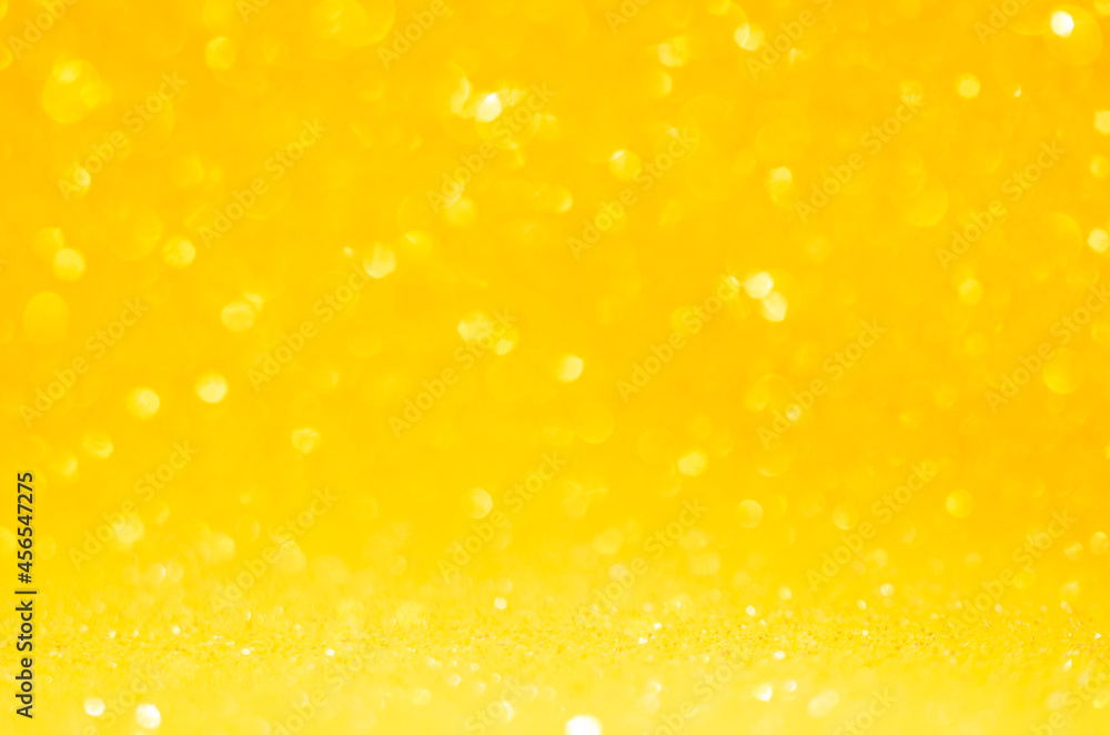 Blurred bokeh made of golden round circles. Abstract background Blurred bokeh made of golden round circles. Abstract background