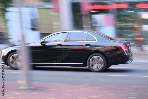 Fast moving car on a street © Sergey