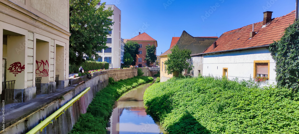 View of the historic center in Eger. Residential buildings and small river Eger-patak. Hungary. Europe