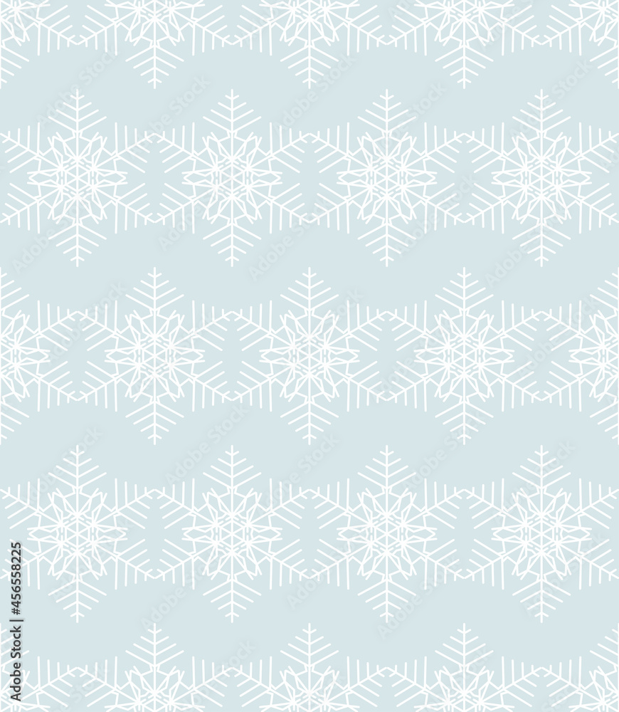 Seamless Christmas pattern. White lace made of snowflakes