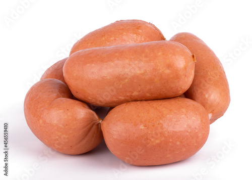 Group of raw sausages isolated on white background close up