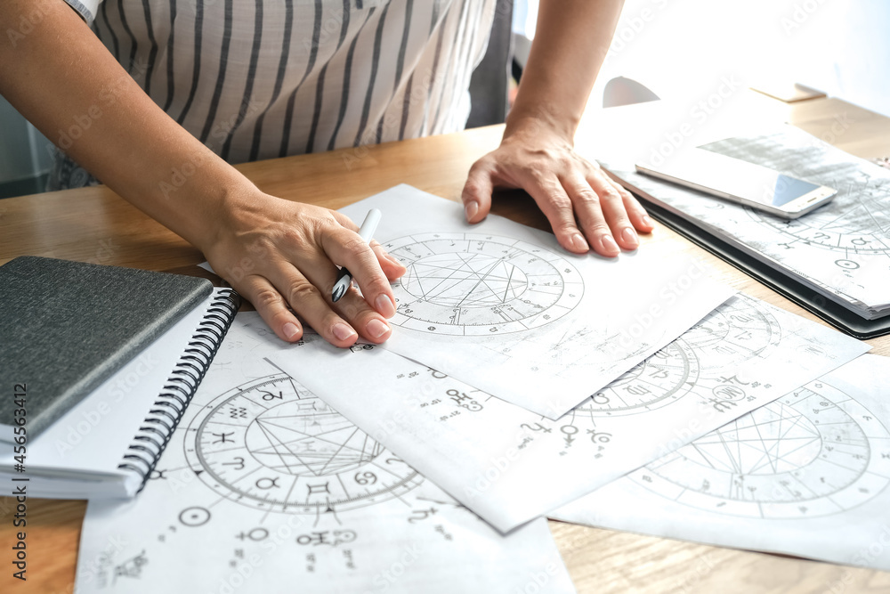 Astrology. Astrologer calculates a natal chart and makes a ...