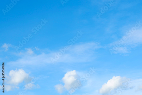 Fototapeta Naklejka Na Ścianę i Meble -  Clean blue sky and white clouds sky background with space for decoration. And used to make wallpaper or bring to work in graphic design..