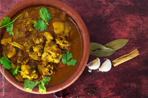 Chicken curry or masala or country chicken kuzhambu Tamilnadu style , chicken curry using fried coconut oil in traditional way and served in a mud pot. Main dish for rice, chapati and paratha...