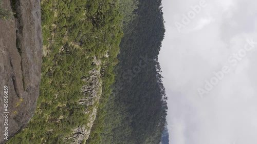 Vertical flipped view of Telapon Volcano in Mexico on a foggy day in 4K photo