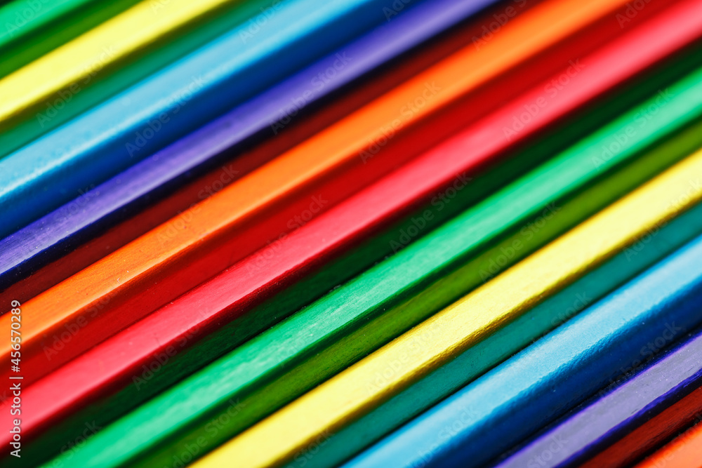 The texture of multi-colored pencils is close-up in full screen.