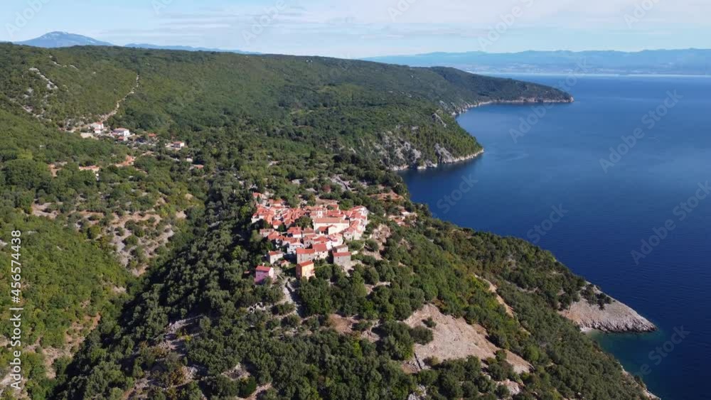Circling around a medieval town at the coastline in Croatia. Circling around a medieval town at the coastline in Croatia.