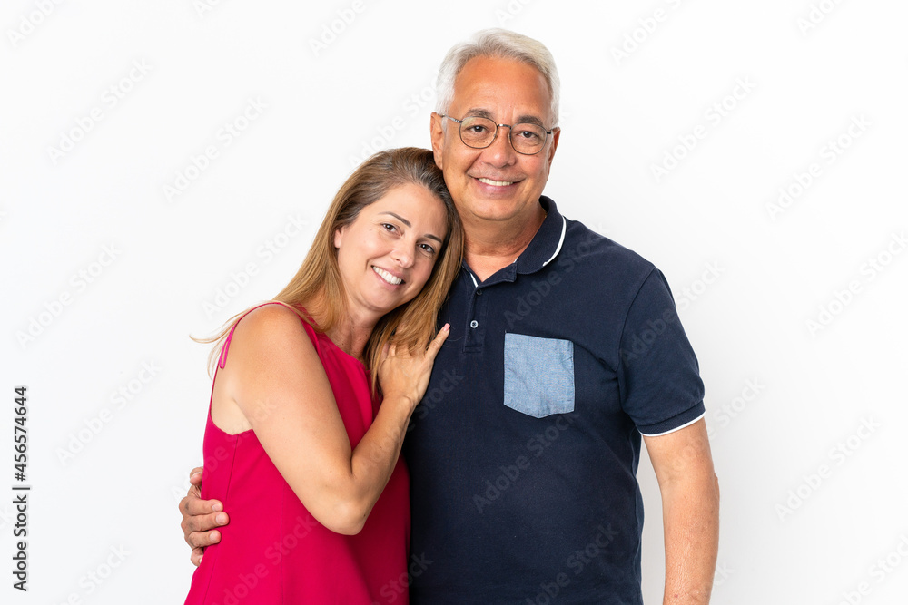 Middle age couple isolated on white background laughing Middle age couple isolated on white background laughing