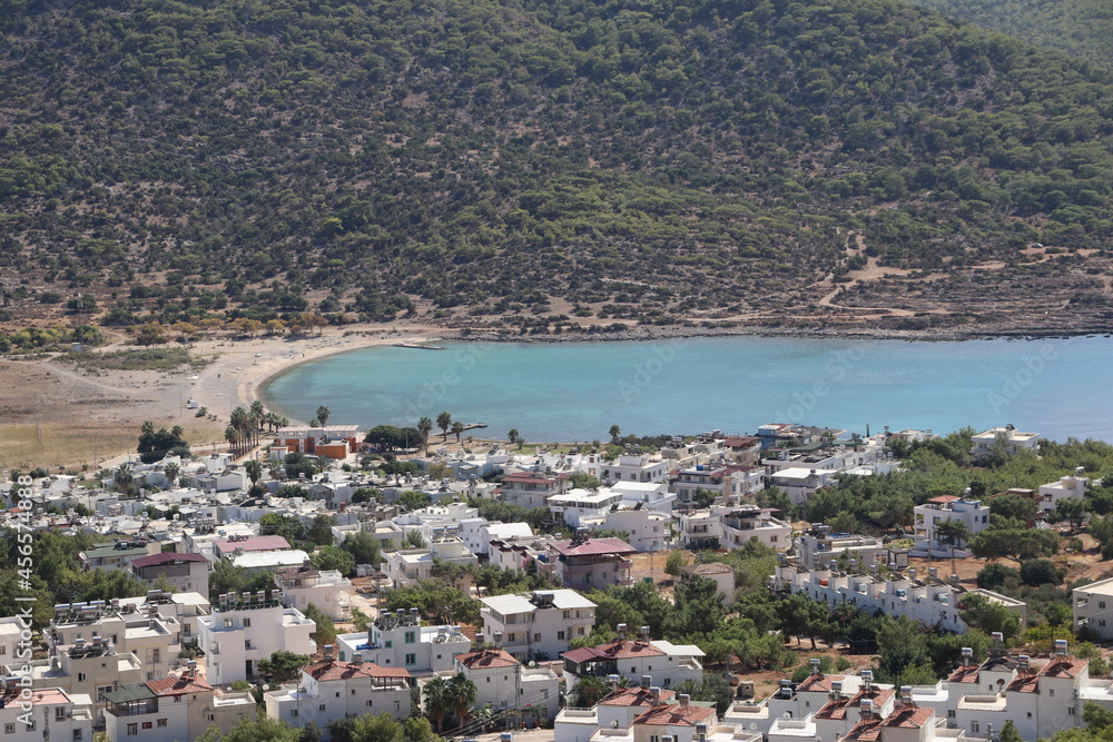 Top view with beach, forest, mountain and city view.