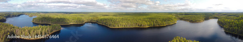 Aerial panorama with a beautiful forest lake. The system of Siya lakes, Arkhangelsk region, Russia.
