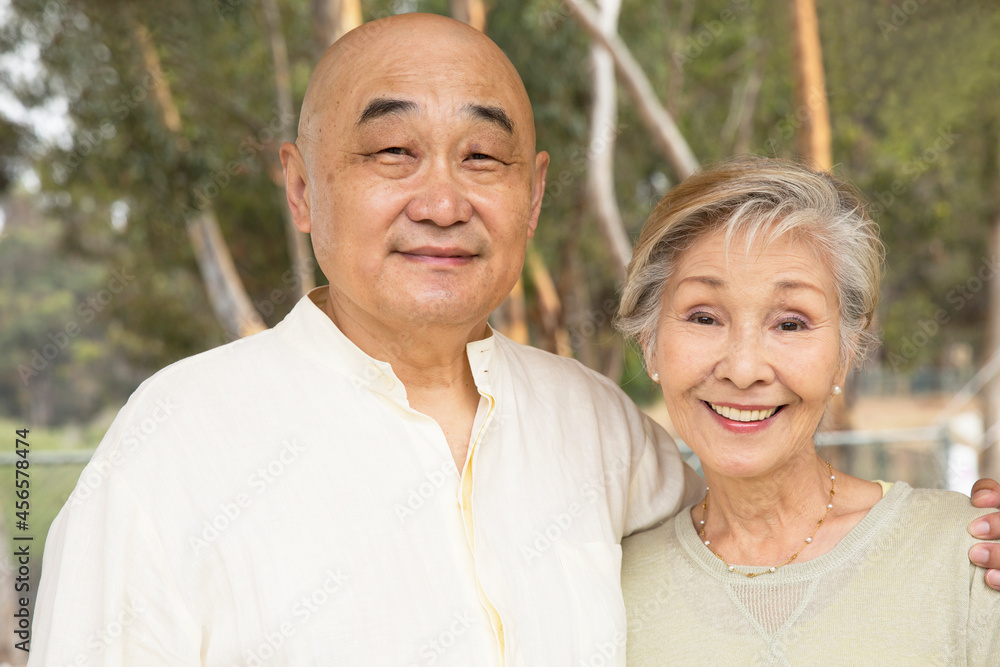 Portrait of senior couple, smiling
