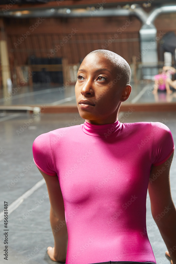 Dancer sitting on floor