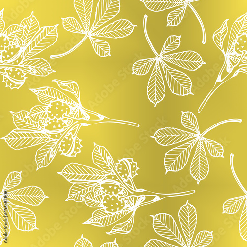 White branches and leaves of horse chestnut on yellow-golden background