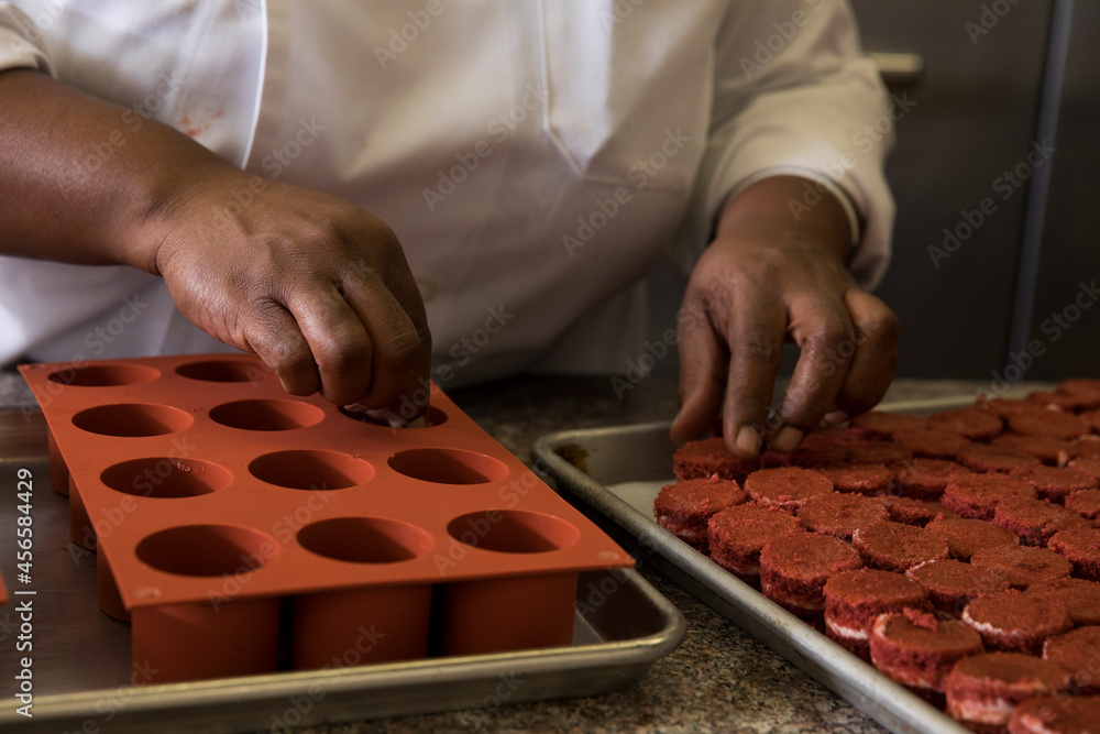 Cropped view of chef preparing cakes Cropped view of chef preparing cakes