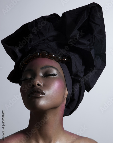 Young woman wearing head tie