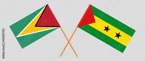 Crossed flags of Guyana and Sao Tome and Principe. Official colors. Correct proportion