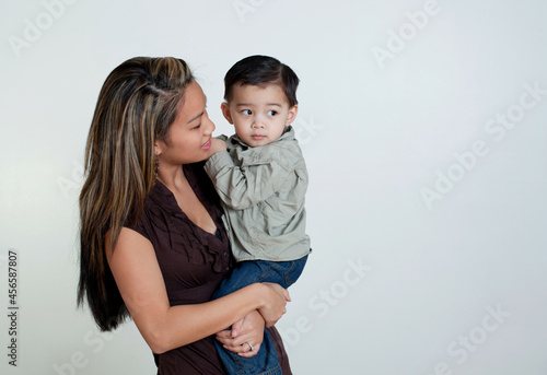 Mother and son, studio shot