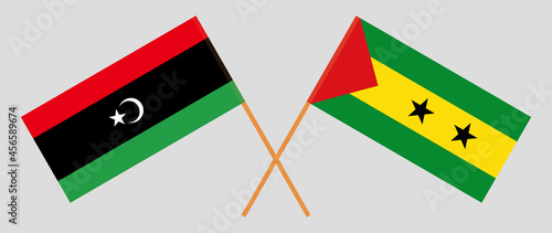 Crossed flags of Libya and Sao Tome and Principe. Official colors. Correct proportion