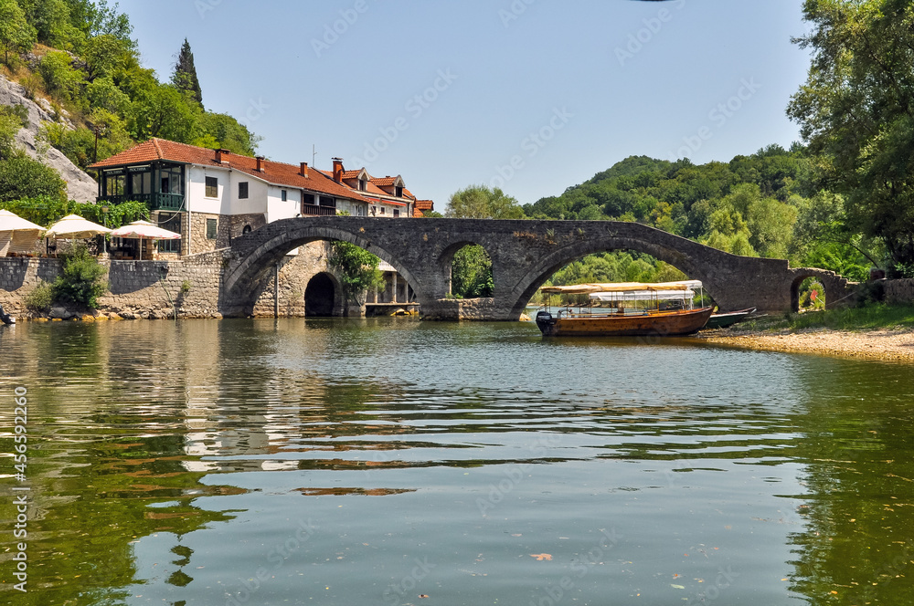 Bridge over the river Chernoevich with old houses in Cetinje, Montenegro, 2021