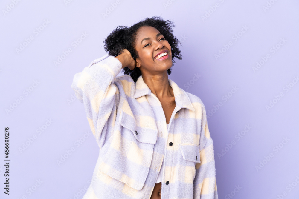 Young African American woman isolated on purple background thinking an idea Young African American woman isolated on purple background thinking an idea