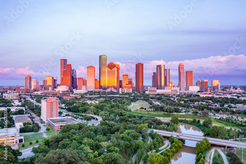 Houston, Texas. Sunset view of Houston Downtown Skyscrapers , showing the bayou and  downtown parks. photo