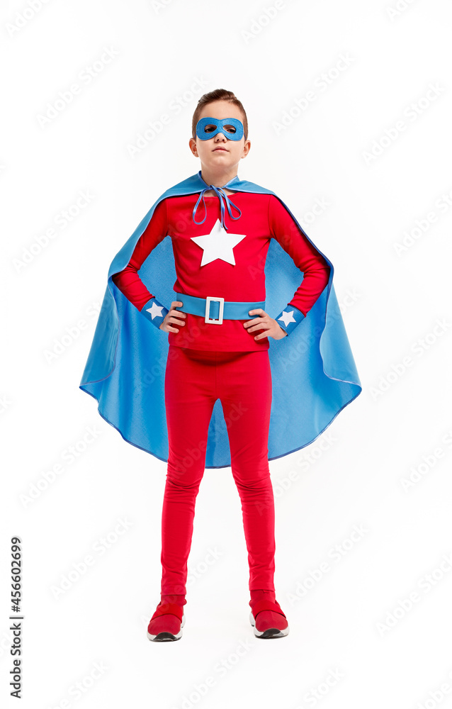 Kid in superhero costume and mask