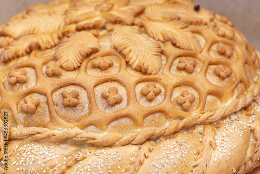 Beautiful bread with patterns and ornaments.
