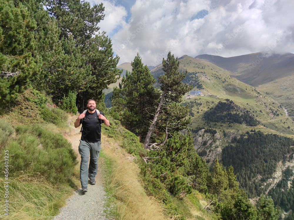hiker on a trail in the Pyrenees Mountains in Catalonia, Spain
