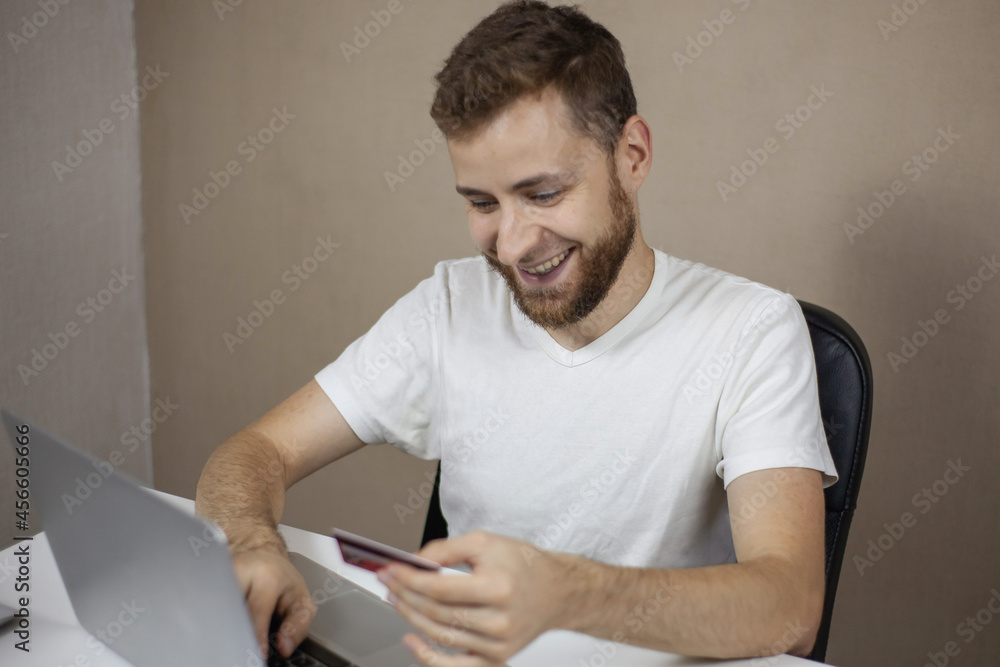 Man making online shopping with credit card Man making online shopping with credit card