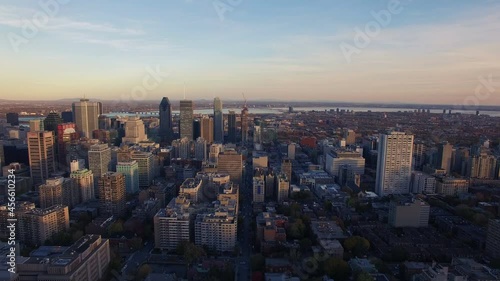 4K aerial drone shot of montreal skyline pan movement at sunset photo