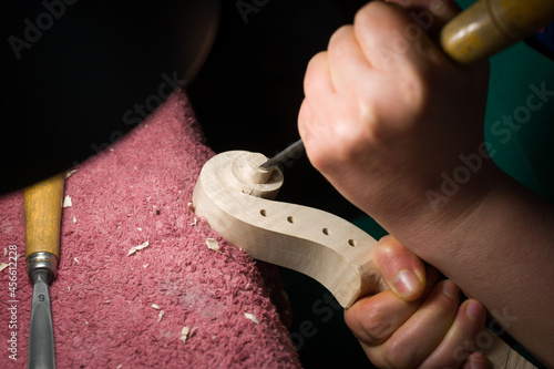 Obraz na plátně luthier while working on the creation of a violin