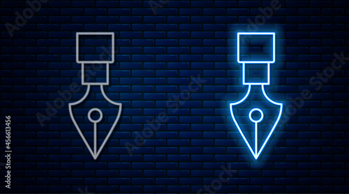 Glowing neon line Fountain pen nib icon isolated on brick wall background. Pen tool sign. Vector