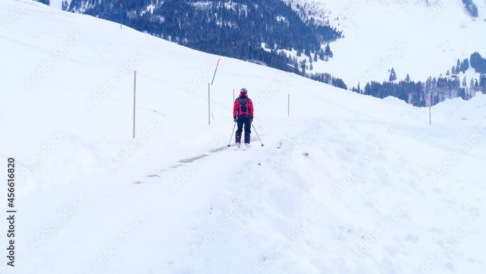 Engelberg, Switzerland - December 2020: Athletes Skiers Prepare for Competitions, Ski During Snowfall, Sports Concept, Healthy Lifestyle, Winter Activity Engelberg, Switzerland - December 2020: Athletes Skiers Prepare for Competitions, Ski During Snowfall, Sports Concept, Healthy Lifestyle, Winter Activity