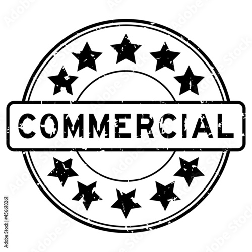 Grunge black commercial word with star icon rubber seal stamp on white background