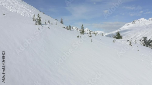 Aerial view Ascending shot, Scenic view of Kühtai Glacier in Tyrol, Austria, mountain range in the background. photo