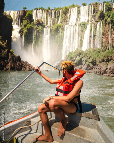 Obraz na plátně person on a canoe at the big waterfalls