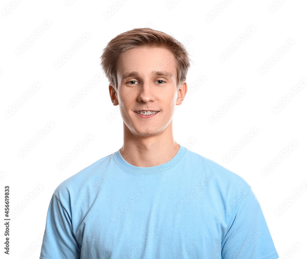 Handsome man with dental braces on white background Handsome man with dental braces on white background